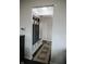 Inviting entryway with built-in storage and stylish rug, leading into the home at 10447 Pintail Ln, Indianapolis, IN 46239