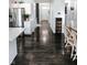 Modern open kitchen featuring dark hardwood floors and stainless steel appliances at 10447 Pintail Ln, Indianapolis, IN 46239