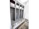 Custom mudroom featuring built-in cubbies, basket storage, and coat hooks for organization and convenience at 10447 Pintail Ln, Indianapolis, IN 46239
