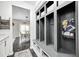 Mudroom with storage lockers and a view into the dining area at 10447 Pintail Ln, Indianapolis, IN 46239