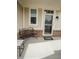 Charming porch area with a stylish metal bench, perfect for relaxing outdoors at 10447 Pintail Ln, Indianapolis, IN 46239
