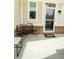 Inviting front porch with a cozy bench and 'Welcome' mat, creating a warm entry at 10447 Pintail Ln, Indianapolis, IN 46239