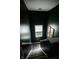 Carpeted staircase leads to the next level, with a bright window and stylish decor at 10447 Pintail Ln, Indianapolis, IN 46239