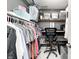 Walk-in closet with wood shelving and multiple rods for storage at 10447 Pintail Ln, Indianapolis, IN 46239