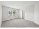 Bright bedroom with plush carpeting, neutral paint, and a window at 1093 Country Meadow Ct, Franklin, IN 46131