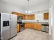 Spacious kitchen with stainless steel appliances, granite countertops, and ample cabinet space at 1093 Country Meadow Ct, Franklin, IN 46131