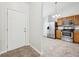 An entry way leads to kitchen featuring stainless steel appliances and tile flooring at 1093 Country Meadow Ct, Franklin, IN 46131