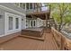 Back deck with hot tub and staircase leading to the lake at 11226 Blackwalnut Pt, Indianapolis, IN 46236