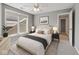 Stylishly furnished bedroom with soft natural light from the window and a calming color palette at 11226 Blackwalnut Pt, Indianapolis, IN 46236