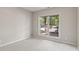 Bedroom with neutral paint and carpet with a beautiful outdoor view from the window at 11226 Blackwalnut Pt, Indianapolis, IN 46236