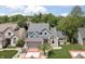 Charming two-story home with brick accents, well-maintained landscaping, and a lovely front yard at 11226 Blackwalnut Pt, Indianapolis, IN 46236