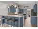 Kitchen featuring a breakfast bar, granite countertops, stainless appliances, and recessed lighting at 11226 Blackwalnut Pt, Indianapolis, IN 46236