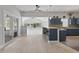 Beautiful kitchen with counter seating, wood floors, stainless appliances, and lots of light at 11226 Blackwalnut Pt, Indianapolis, IN 46236