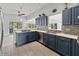 Well-lit kitchen with stainless steel appliances, ample cabinet space and adjacent dining area at 11226 Blackwalnut Pt, Indianapolis, IN 46236