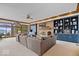 Spacious living room with built-in bookshelves, fireplace and large picture windows at 11715 Landings Dr, Indianapolis, IN 46256
