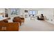 Spacious main bedroom features a fireplace, sitting area, and access to a private balcony with scenic views at 11715 Landings Dr, Indianapolis, IN 46256