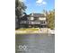 Exceptional waterfront home with multiple decks, a stone seawall, and private dock, offering stunning lake views at 11715 Landings Dr, Indianapolis, IN 46256