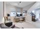 Functional home office space with natural light, a modern desk, and comfortable chair at 13217 E 131St St, Fishers, IN 46037
