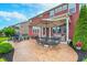 Relaxing backyard patio with outdoor seating, perfect for entertaining and enjoying the outdoors at 14075 Knightstown E Dr, Carmel, IN 46033