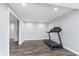 Finished basement area shows neutral paint, recessed lighting, and modern flooring at 14075 Knightstown E Dr, Carmel, IN 46033