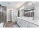 Beautiful bathroom featuring a double vanity, walk-in shower and tile flooring at 14075 Knightstown E Dr, Carmel, IN 46033