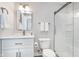 Updated bathroom features glass enclosed shower and modern vanity at 14075 Knightstown E Dr, Carmel, IN 46033