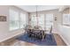 Inviting dining room featuring natural light, wood table, and a cozy atmosphere at 14075 Knightstown E Dr, Carmel, IN 46033