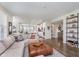 Open concept living area seamlessly connects to the kitchen and dining area at 14075 Knightstown E Dr, Carmel, IN 46033