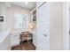 Cozy home office nook with built-in desk, natural light, and storage at 14075 Knightstown E Dr, Carmel, IN 46033