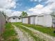 Large backyard with a detached garage, shed, and plenty of green space at 1415 Lawton Ave, Indianapolis, IN 46203