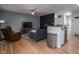 Spacious living room featuring stylish decor, hardwood floors, and an open layout, perfect for entertaining and modern living at 1415 Lawton Ave, Indianapolis, IN 46203