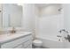 Bathroom with modern fixtures, granite counters, and a soaking tub for a tranquil and relaxing experience at 14515 Hanford Ln, Carmel, IN 46074