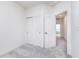 Bright bedroom with plush carpet and a sliding closet door for convenient storage and organization at 14515 Hanford Ln, Carmel, IN 46074