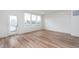 Bright living room offers hardwood floors and ample natural light at 14515 Hanford Ln, Carmel, IN 46074