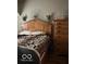 Cozy bedroom featuring a wooden bed frame and ample natural light at 1517 S Reisner St, Indianapolis, IN 46221
