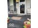 Inviting front porch with cozy seating and charming decor at 1517 S Reisner St, Indianapolis, IN 46221