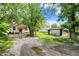 Spacious backyard with a large shed and room for outdoor activities and relaxation at 1523 E Mills Ave, Indianapolis, IN 46227