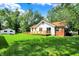 Home featuring a spacious backyard with ample room for entertaining and recreation at 1523 E Mills Ave, Indianapolis, IN 46227