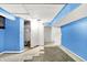 A colorful unfinished basement offering ample storage space and potential for customization at 1523 E Mills Ave, Indianapolis, IN 46227