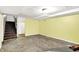 An unfinished basement offering ample storage space with stairs in view at 1523 E Mills Ave, Indianapolis, IN 46227