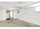 A bright unfinished basement featuring a window and closet space at 1523 E Mills Ave, Indianapolis, IN 46227