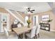 Bright dining room with sleek table, seating for six, and stylish decor at 1523 E Mills Ave, Indianapolis, IN 46227