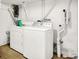 Functional laundry area featuring a washer and dryer setup at 1523 E Mills Ave, Indianapolis, IN 46227