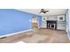 Spacious living room highlighting the fireplace and archway at 1523 E Mills Ave, Indianapolis, IN 46227