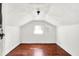 A room featuring hardwood floors, white walls and a window at 1523 E Mills Ave, Indianapolis, IN 46227