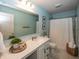 Clean bathroom with a spacious vanity, large mirror, and a shower with curtain at 16419 Connolly Dr, Westfield, IN 46074