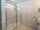 Modern bathroom featuring a glass-enclosed shower with chrome hardware and a bright interior at 16419 Connolly Dr, Westfield, IN 46074