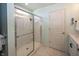 Bathroom features a glass shower with white tile and a white door at 16419 Connolly Dr, Westfield, IN 46074