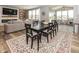 Inviting dining area with open-concept living space and lots of natural light at 16419 Connolly Dr, Westfield, IN 46074