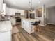 Well-lit kitchen features an island with barstool seating and stainless steel appliances at 16419 Connolly Dr, Westfield, IN 46074